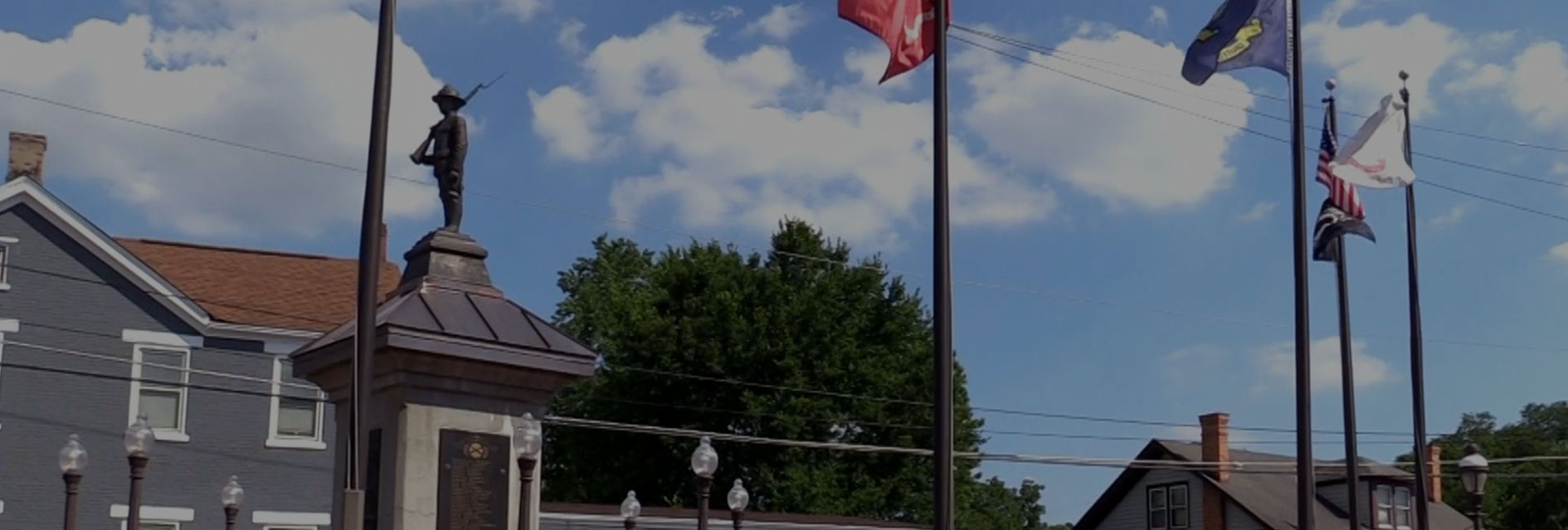 The City of Reading's World War I doughboy monument, with flags flying